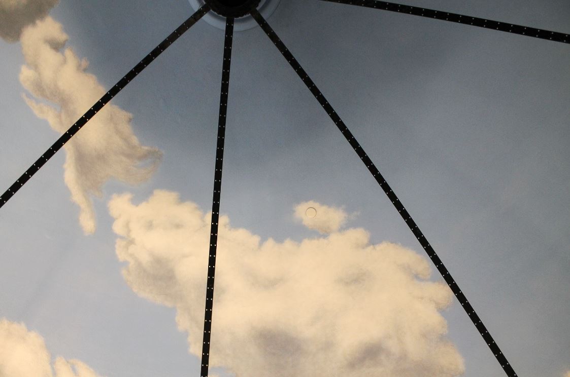 Ceiling within the museum, of a sky with clouds