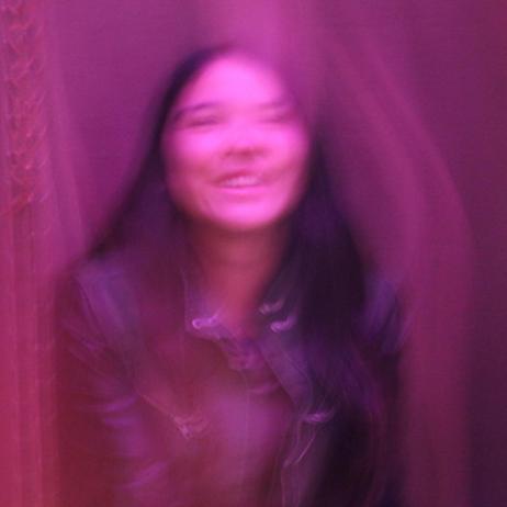 Young woman, as a blurred image